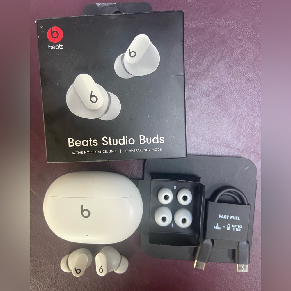 Gently used white Beats Studio Buds.